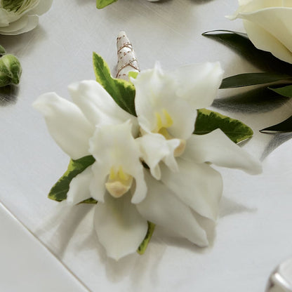 White Mini Cymbidium Boutonniere – LEE'S FLORIST & GREENHOUSE, Center Line MI